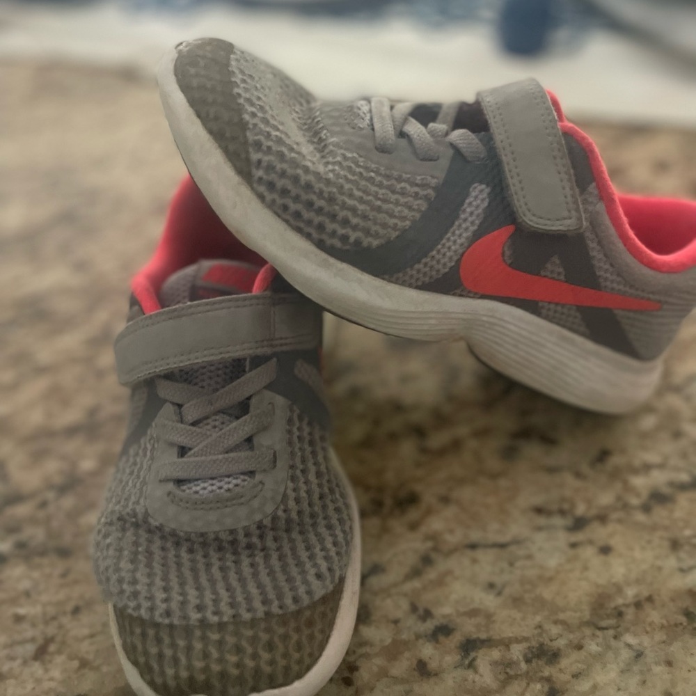 NIKE Kids Gray and Pink Athletic Shoes. Revolution 4